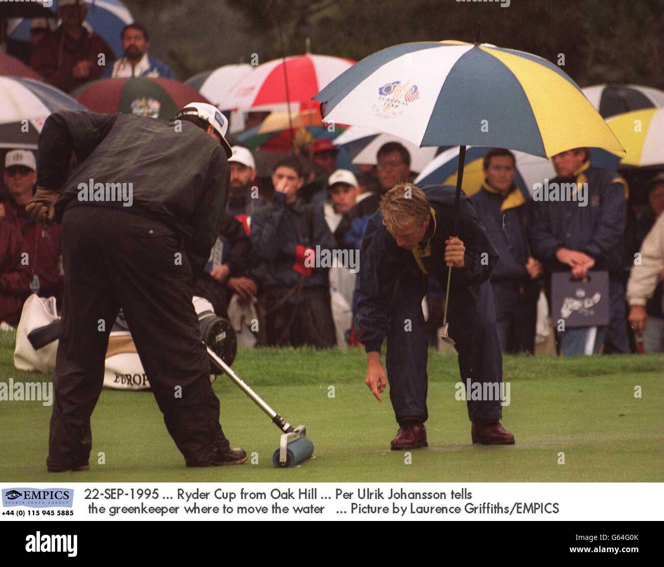 22-SEP-1995. Ryder Cup from Oak Hill. Per Ulrik Johansson tells the greenkeeper where to move the water. Picture by Laurence Griffiths/EMPICS Stock Photo