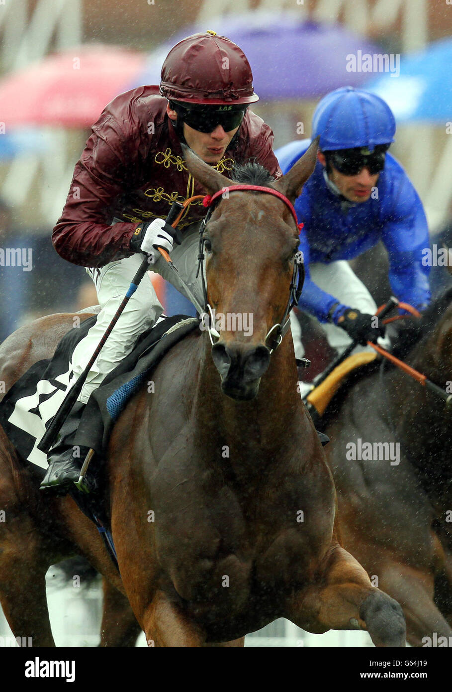 Kiyoshi, ridden by Adam Kirby (left) go on to win the British Stallion Studs Supporting British Racing E.B.F Fillies Stakes during the May Festival at Goodwood Racecourse, West Sussex. PRESS ASSOCIATION Photo. Picture date: Thursday May 23, 2013. Photo credit should read: Sean Dempsey/PA Wire. Stock Photo