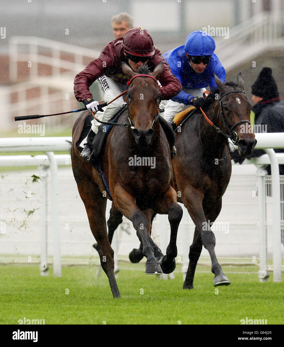 Kiyoshi, ridden by Adam Kirby (left) go on to win the British Stallion Studs Supporting British Racing E.B.F Fillies Stakes during the May Festival at Goodwood Racecourse, West Sussex. Stock Photo