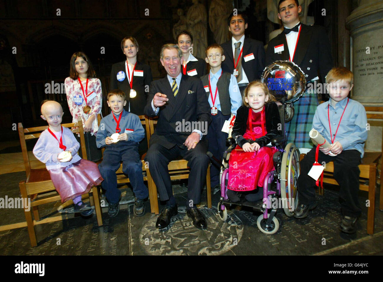 The Prince of Wales at the annual Women's Own Children of Courage Awards at Westminster Abbey with: * back row, from left to right, Rosy Simkiss, Karla Ingliss, Ben Vince, Khaleeq Khan, Marino Giorgetti; front row, Hayley Okines, Bradley Prescott, Colin Antink, Megan Reynolds, and Ben Clinton. Britain's bravest youngsters were honoured for their courage at the ceremony, attended by celebrity guests such as TV presenter Cat Deeley and ex-Take That singer Mark Owen. Ten children singled out for their remarkable actions and courageous stance on life received the awards at the event. Stock Photo