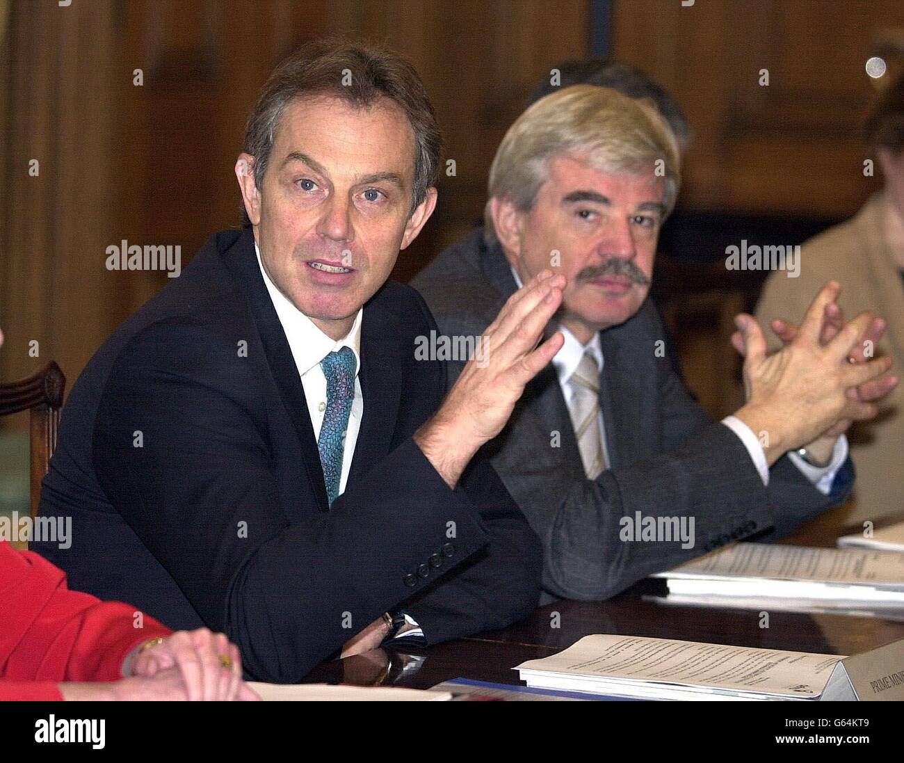Prime Minister, Tony Blair sits next to Lord Whitty, Parliamentary Under Secretary for Environment, Food and Rural Affairs at a farmers and food producers meeting at No. 10 Downing Street, London. * The food and farming sector will play an important role in improving the health of the nation, the Government has announced. An action plan covering a wide range of issues is aimed at encouraging people to eat a better diet. Stock Photo