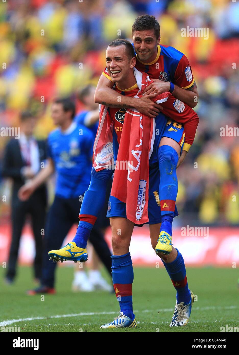 Soccer - npower Football League Championship - Play Off - Final - Crystal Palace v Watford - Wembley Stadium. Crystal Palace's Andre Moritz (top) and Aaron Wilbraham celebrate winning the npower Football League Championship play off final Stock Photo
