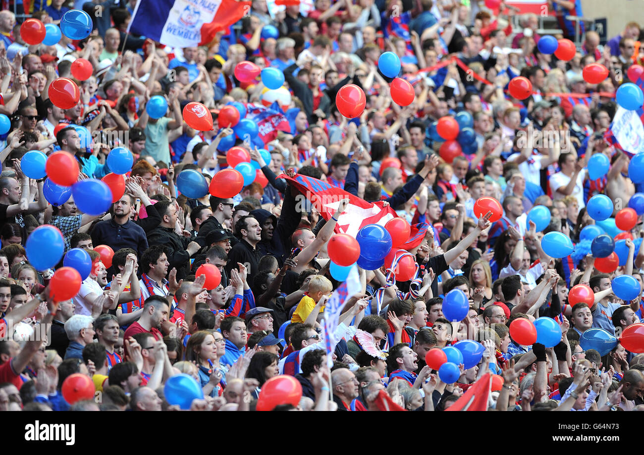 Soccer - npower Football League Championship - Play Off - Final - Crystal Palace v Watford - Wembley Stadium. Crystal Palace fans blow up balloons in the stands before kick off Stock Photo