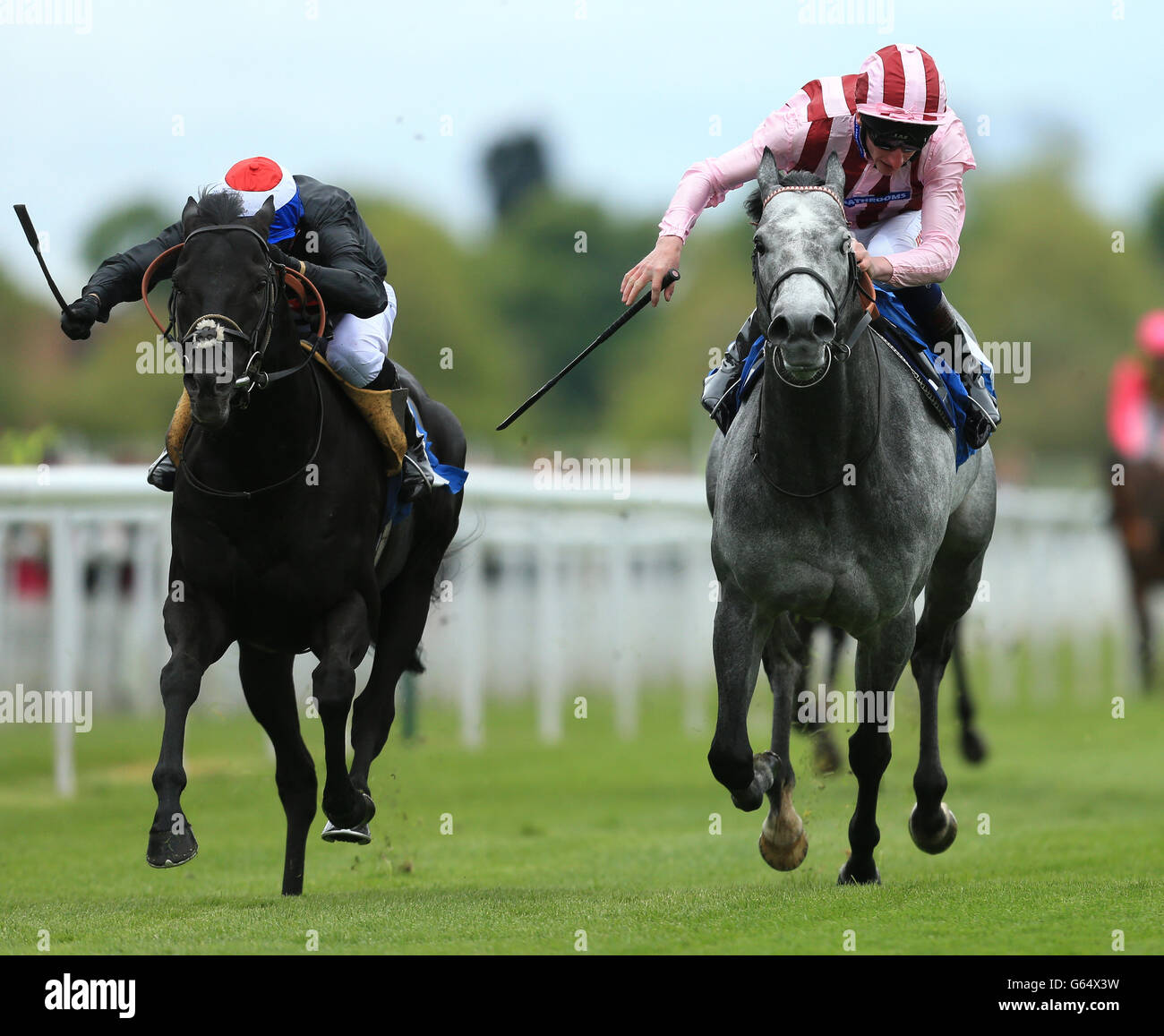 Society Rock ridden by Kieren Fallon (l) beats Lethal Force ridden by Adam Kirby to win The Duke of York Clipper Logistics Stakes Stock Photo