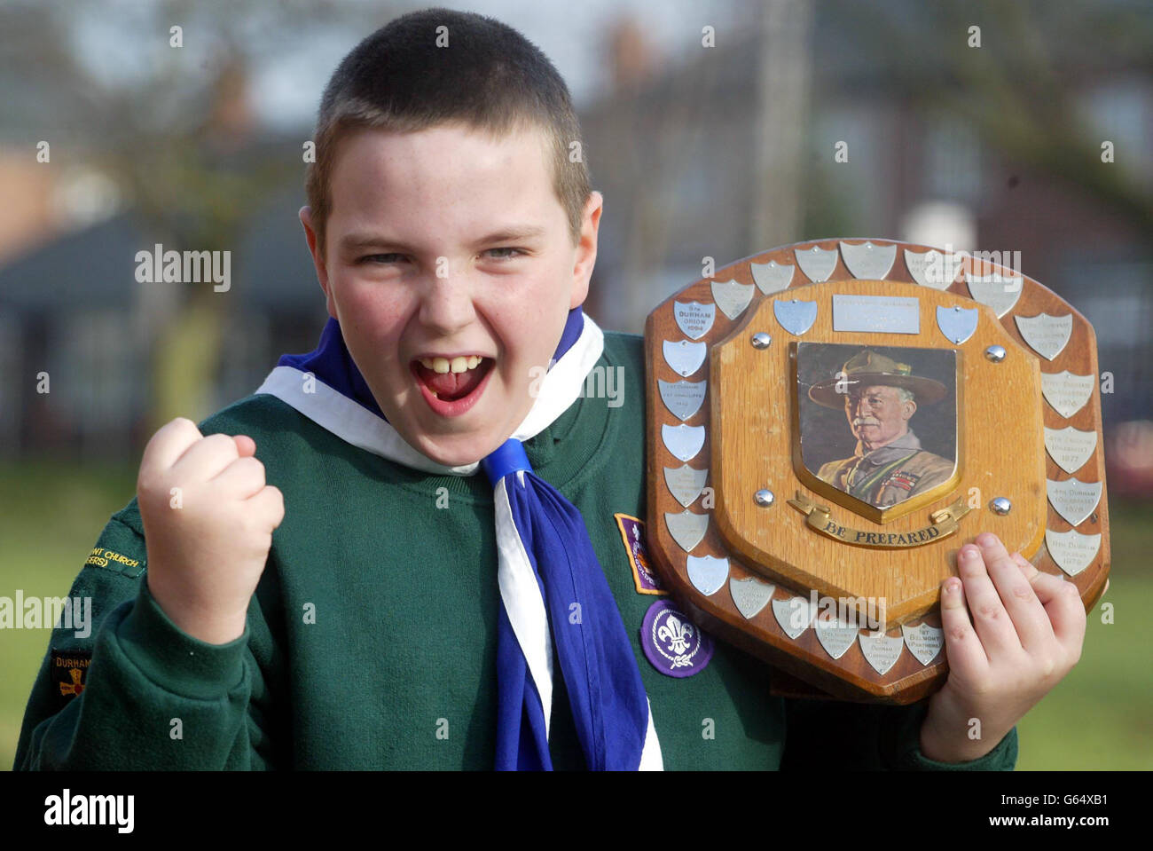 Joseph Smith holding up his winners shield. The 10-year-old Cub Scout of Pittington Primary School, Co Durham won a team swimming gala on his own after the rest of his troops failed to turn up. Joseph won all 12 races that he entered. Stock Photo
