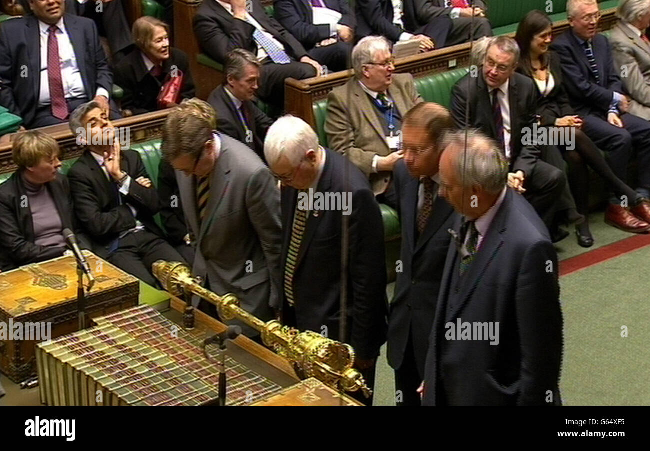 MPs approach the bench, during a Eurosceptic amendment expressing regret that the Government had not included an EU referendum Bill in the Queen's Speech, which won the support of 130 MPs tonight, in the House of Commons, London. Stock Photo