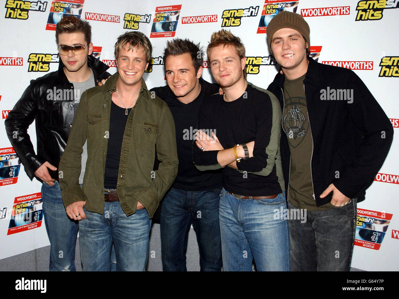 EDITORIAL USE ONLY : Westlife, (left-right) Mark Feehily, Kian Egan, Shane Filan, Nicky Byrne and Bryan McFadden who won awards for the Best Band on Planet Pop, Best International Act and a special award, *... The Smash Hits Cover of the Year at the Smash Hits T4 Poll Winners Party at the London Arena. 22/2/03: boy band Westlife have reassured fans that they have no intention of splitting up. Band member Shane Filan was reported to have threatened to quit following a row over the sacking of their tour manager. But today the boys issued a categorical denial and Shane said they were definitely Stock Photo