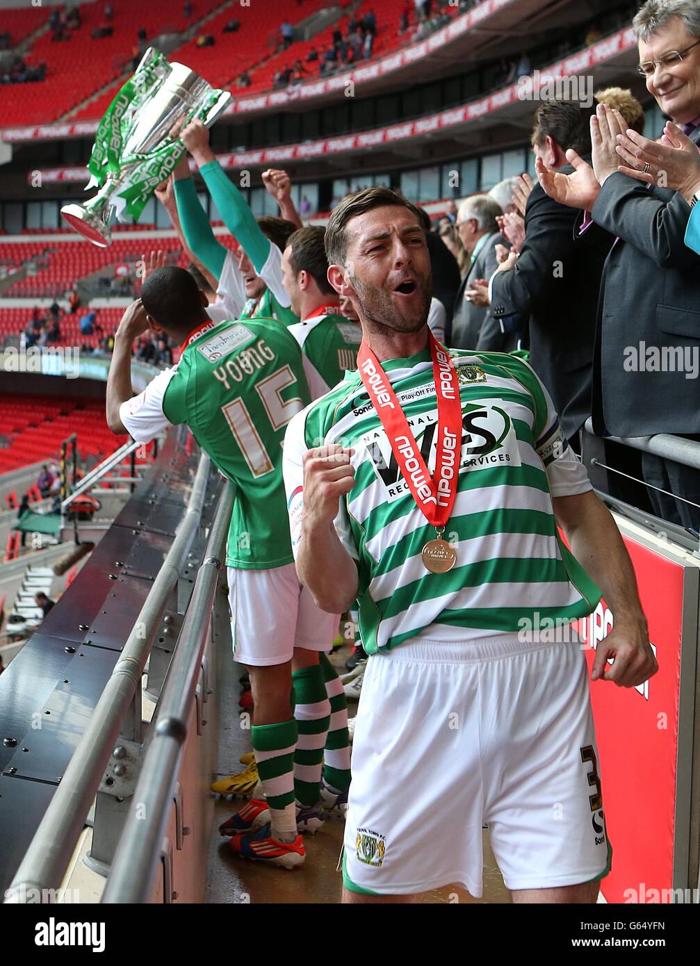 Soccer - npower Football League One - Play Off - Final - Brentford v Yeovil Town - Wembley Stadium. Yeovil Town captain James McAllister celebrates as goalkeeper Marek Stech lifts the Football League One Play Off Final trophy Stock Photo