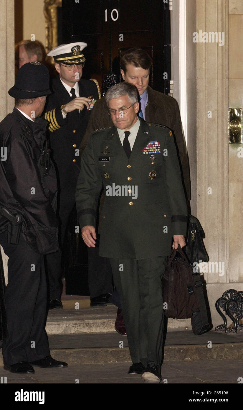 Senior United States miliatry officials leave 10 Downing Street, central London. The Prime Minister's Office is reportedly in close contact with the United States Government, as plans are finalised for a proposed armed response in Iraq. * should UN arms inspectors face obstruction from the Iraqi authorities. Stock Photo