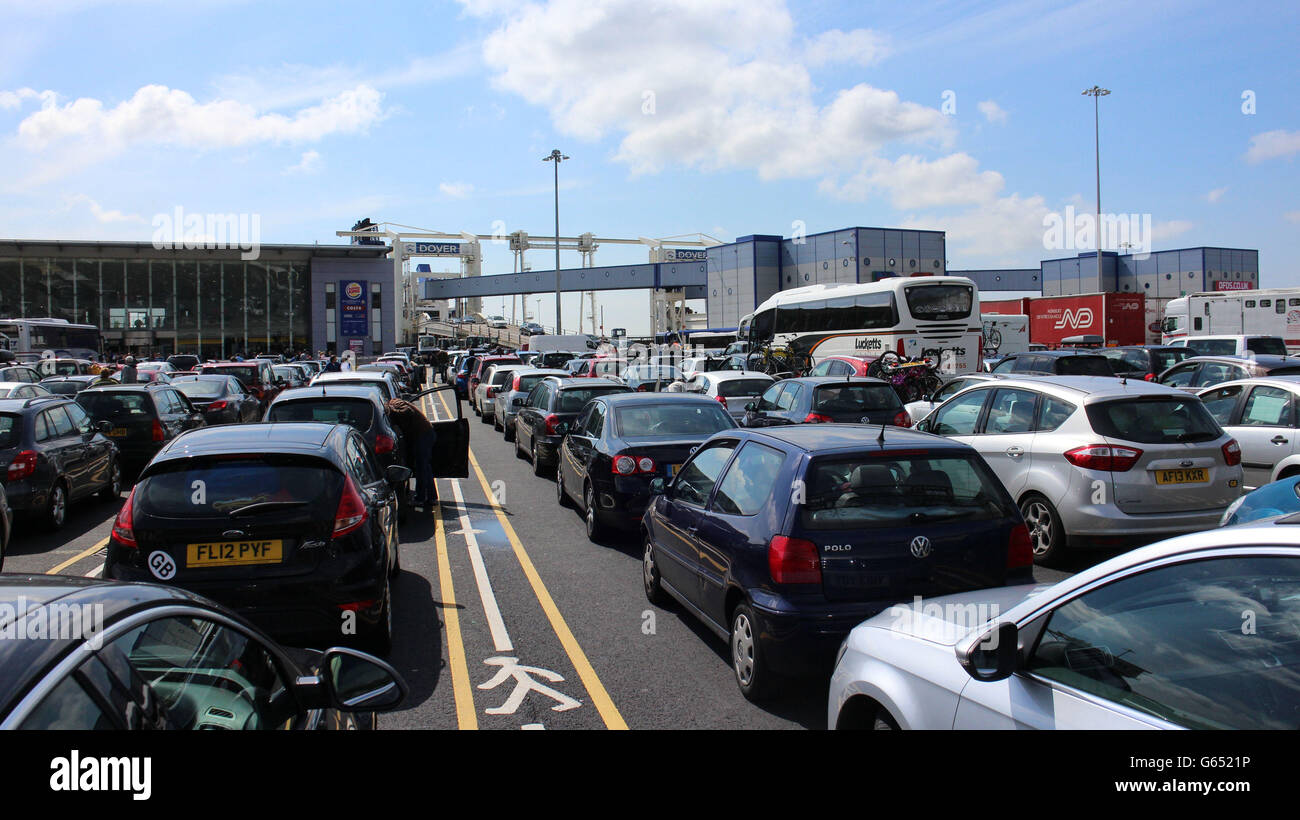 Queues of cars at Dover waiting to board a ferry to France as bank holiday getaway starts. Thousands of people will escape the dismal British weather and seek sun for the May bank holiday weekend. Stock Photo