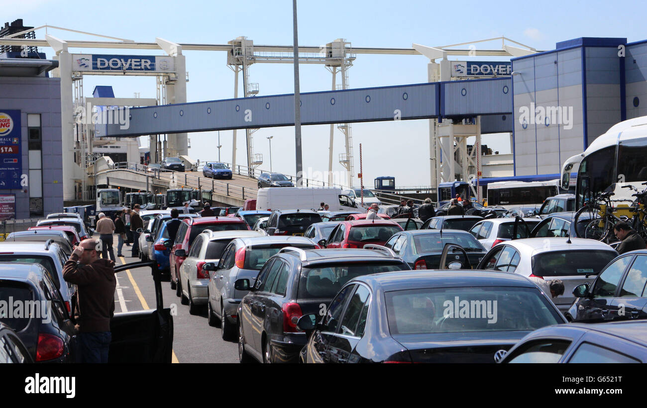 Queues of cars at Dover waiting to board a ferry to France as bank holiday getaway starts. Thousands of people will escape the dismal British weather and seek sun for the May bank holiday weekend. Stock Photo