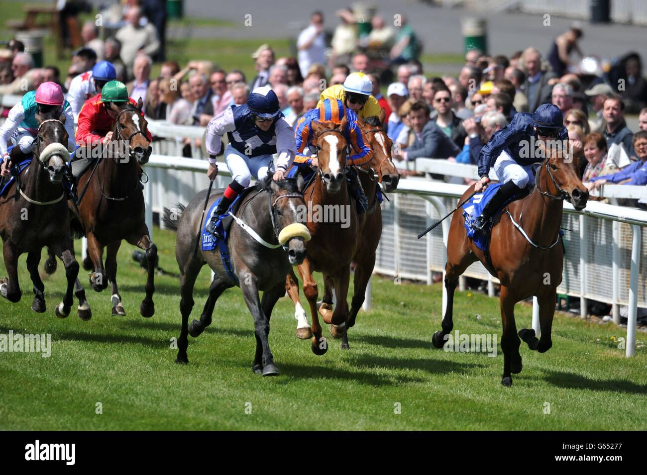 Glassatura ridden by Shane Foley (centre) goes on to win the the equisoftlive.com European Breeders Fund Fillies Maiden during the Tattersalls Irish 2000 Guineas Day at Curragh Racecourse, County Kildare. Stock Photo