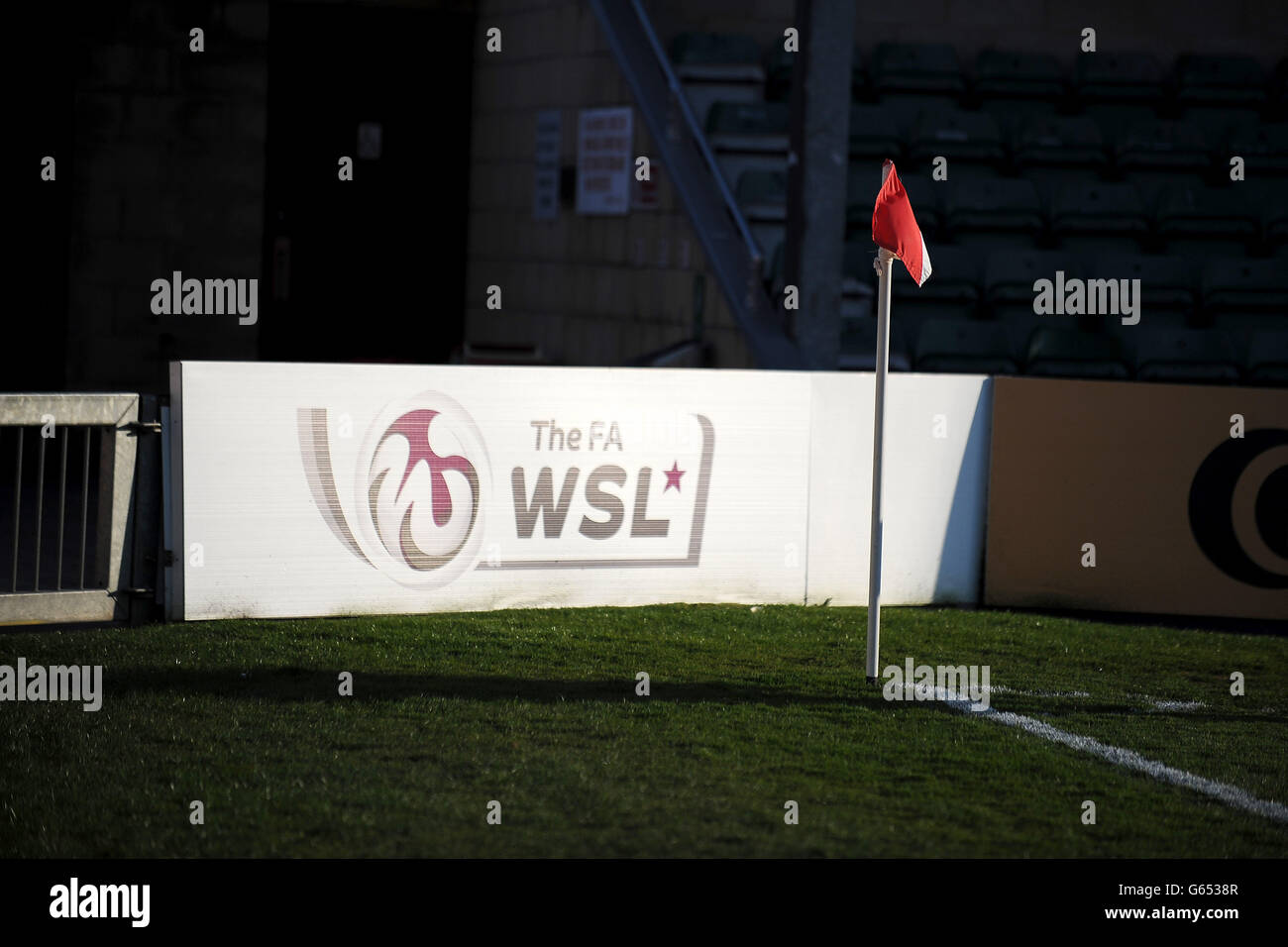Soccer - FA Women's Super League - Lincoln City Ladies v Arsenal Ladies - Sincil Bank. Detail of a corner flag and board reading The FA WSA. Stock Photo