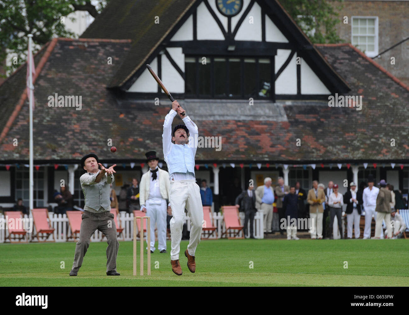 Alex Preston bats dressed in Victorian costume during the Wisden