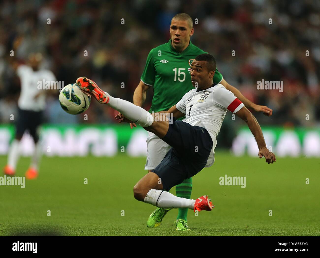 Soccer - International Friendly - England v Republic of Ireland - Wembley Stadium. England captain for the night Ashley Cole clears the ball away from danger Stock Photo
