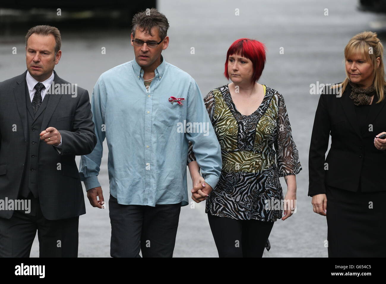 Paul and Coral Jones (centre), the parents of April Jones arrive at Mold Crown Court, as the jury continues considering its verdicts today, against Mark Bridger, the man accused of the murder of their daughter April, after it was sent out to begin its deliberations yesterday afternoon after a month long trial. Stock Photo