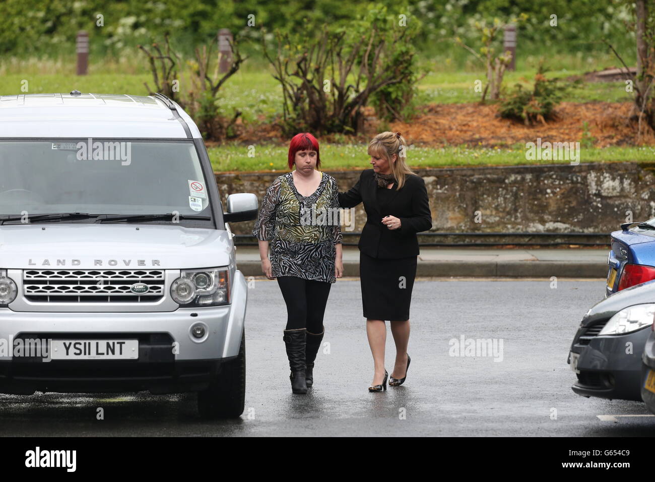 Coral Jones (left) the mother of April Jones, arrives at Mold Crown Court, as the jury continues considering its verdicts today, against Mark Bridger, the man accused of the murder of their daughter April, after it was sent out to begin its deliberations yesterday afternoon after a month long trial. Stock Photo