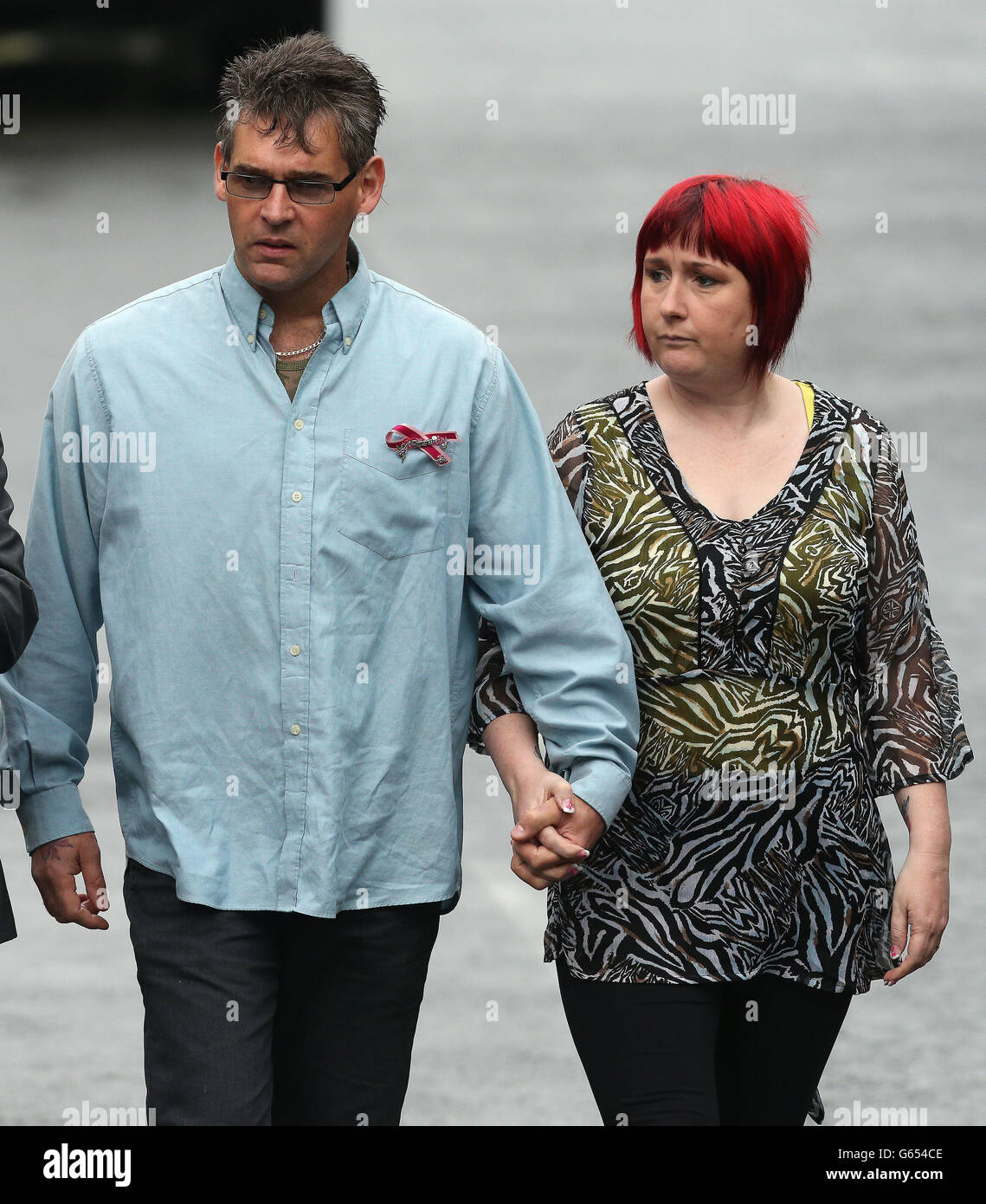 Paul and Coral Jones, the parents of April Jones arrive at Mold Crown Court, as the jury continues considering its verdicts today, against Mark Bridger, the man accused of the murder of their daughter April, after it was sent out to begin its deliberations yesterday afternoon after a month long trial. Stock Photo