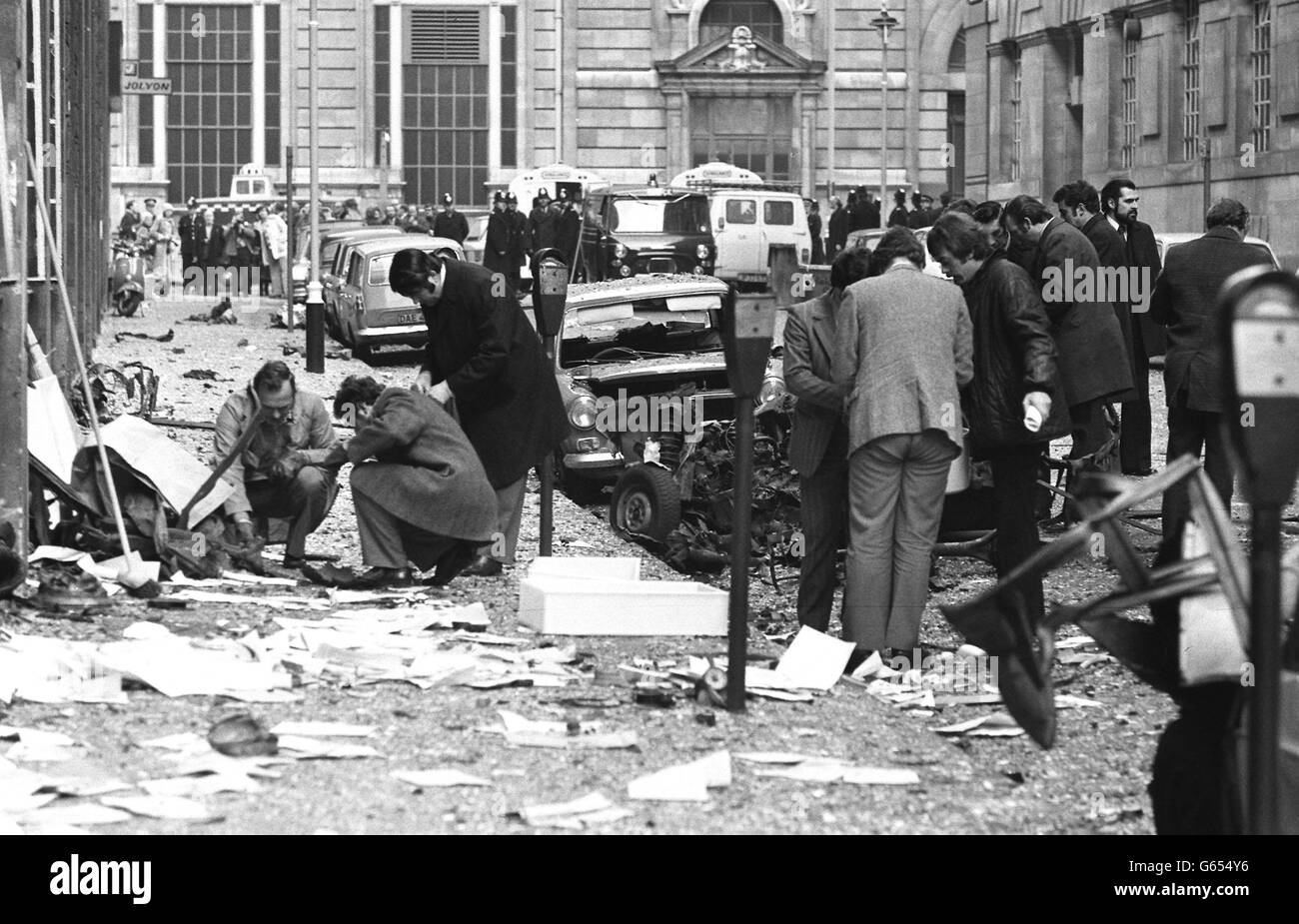 A line of damaged cars. A line of damaged cars pictured after a car bomb in Westminster. Stock Photo