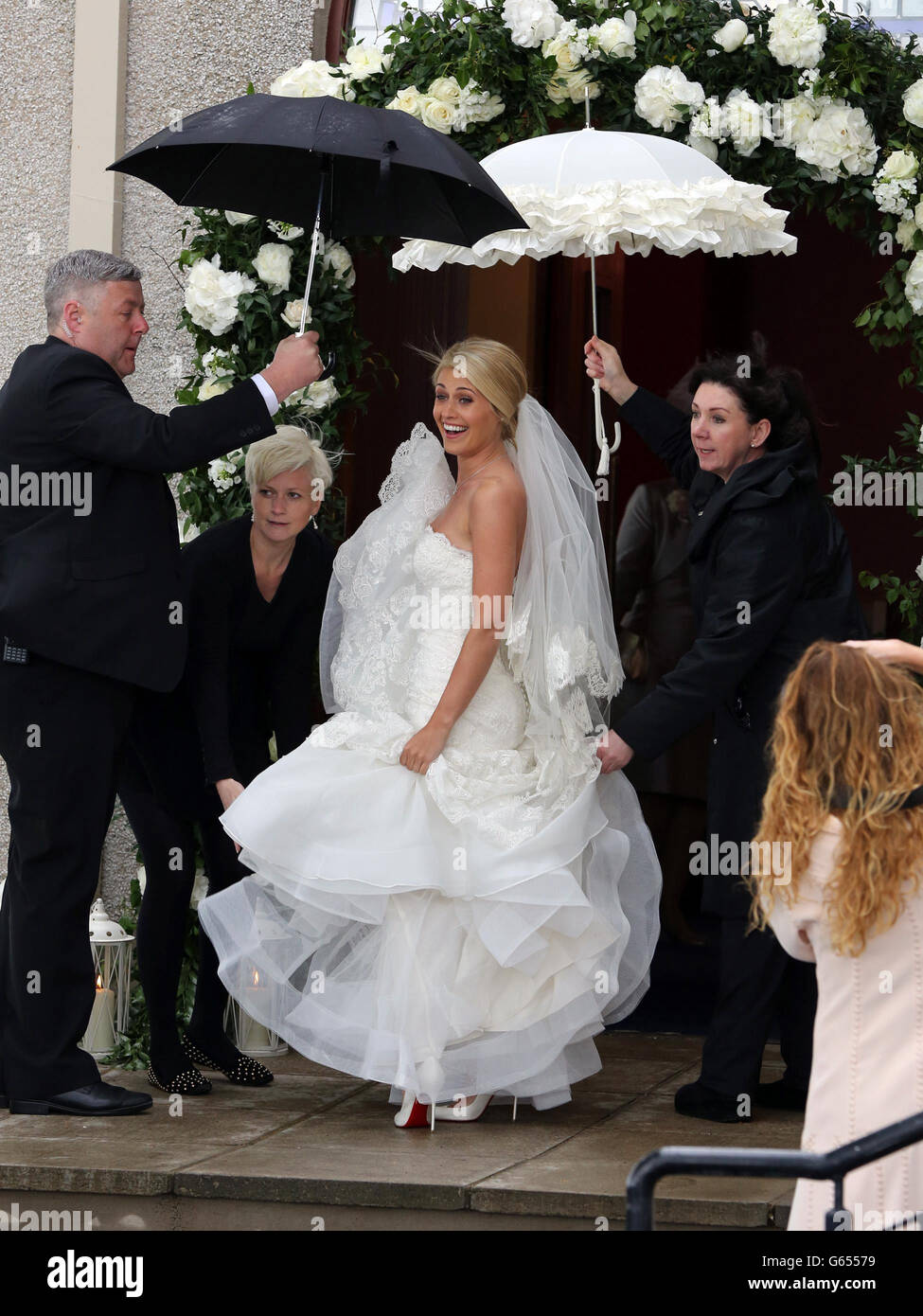 Bride Helen McConnell arrives for her wedding to Manchester United footballer Jonny Evans as at Clough Presbyterian Church, County Down. Stock Photo