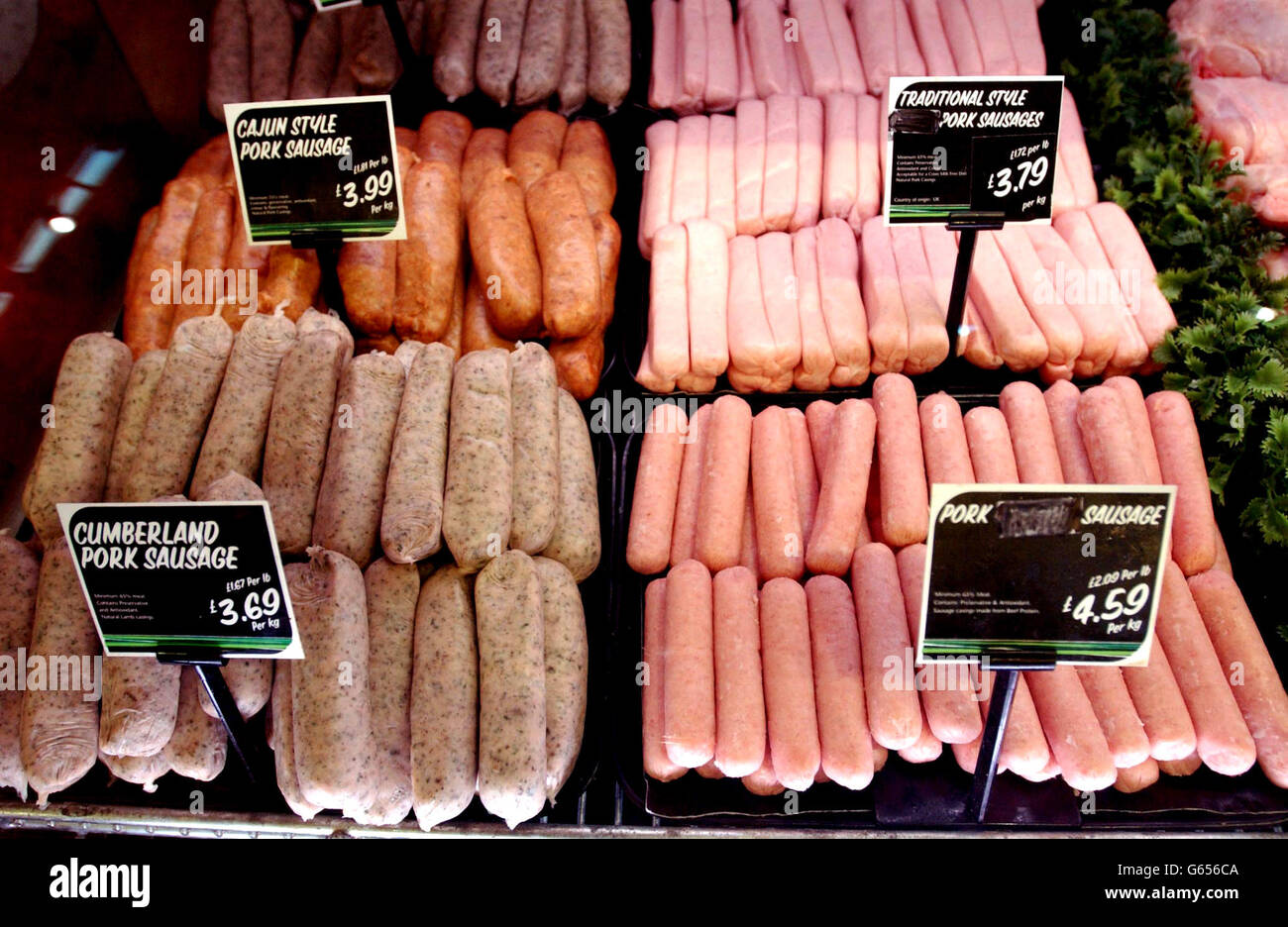 Sausages on display in a supermarket Stock Photo Alamy