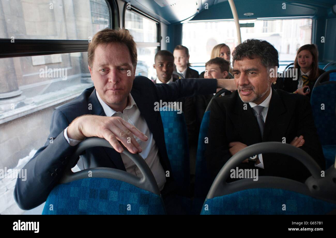 Deputy Prime Minister Nick Clegg and business entrepreneur James Caan meet teenagers aboard a bus travelling to several companies in London to discuss future career opportunities and how to get on the employment ladder, as part of the government's Opening Doors Awards in which companies are encouraged to help young people into work placements. Stock Photo