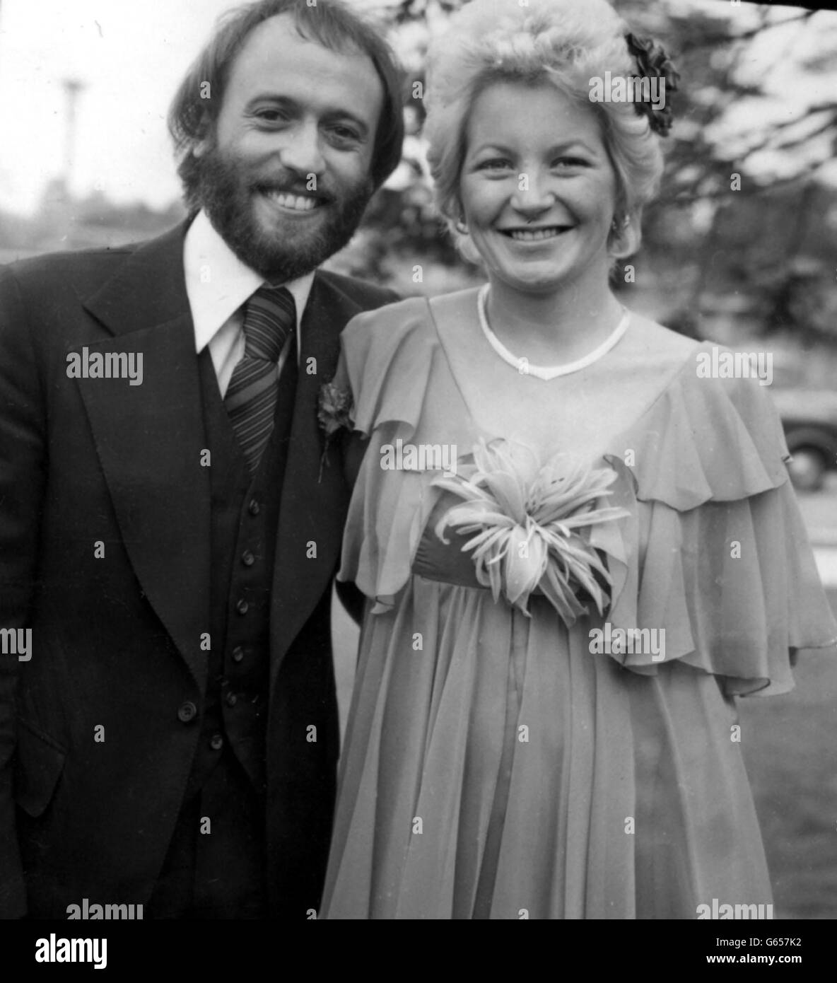 Bee Gee Maurice Gibb and his bride Yvonne Spenceley after they were married at Haywards Heath Register Office. Maurice, recently divorced from singer Lulu, met Yvonne when the Bee Gees were singing in a night club in Batley, Yorkshire, where she was working. 12/01/03 : Bee Gee Maurice Gibb and his bride Yvonne Spenceley after they were married at Haywards Heath Register Office. Gibb died in hospital on Sunday 12th 2003, his family said. The 53-year-old had been in a critical condition in hospital after suffering a heart attack during an operation to remove an intestinal blockage after he Stock Photo
