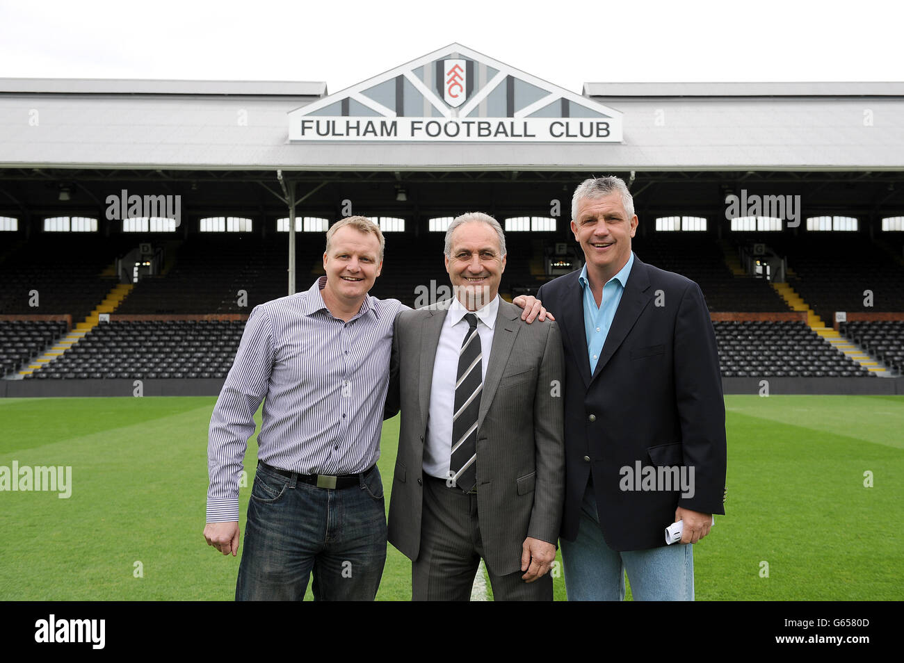 Fulham joint managers Simon Morgan, Les Strong and Tony Gale (left to right) pose for a photo before the game Stock Photo