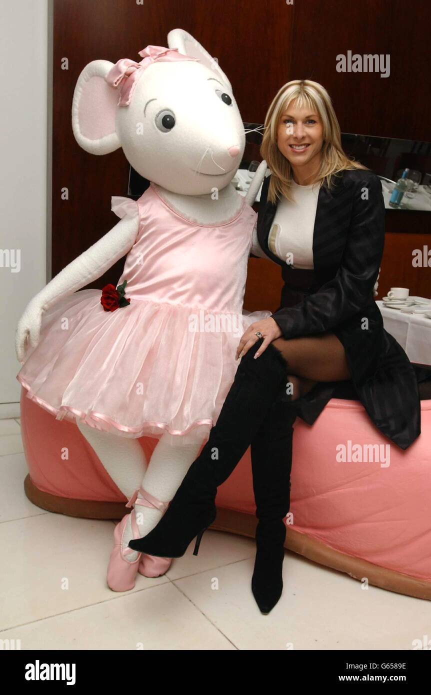 Former Olympic swimmer Sharron Davies poses with children's TV star Angelina Ballerina during the Nutcracker premiere pre-performance party at the Coliseum in London. Stock Photo