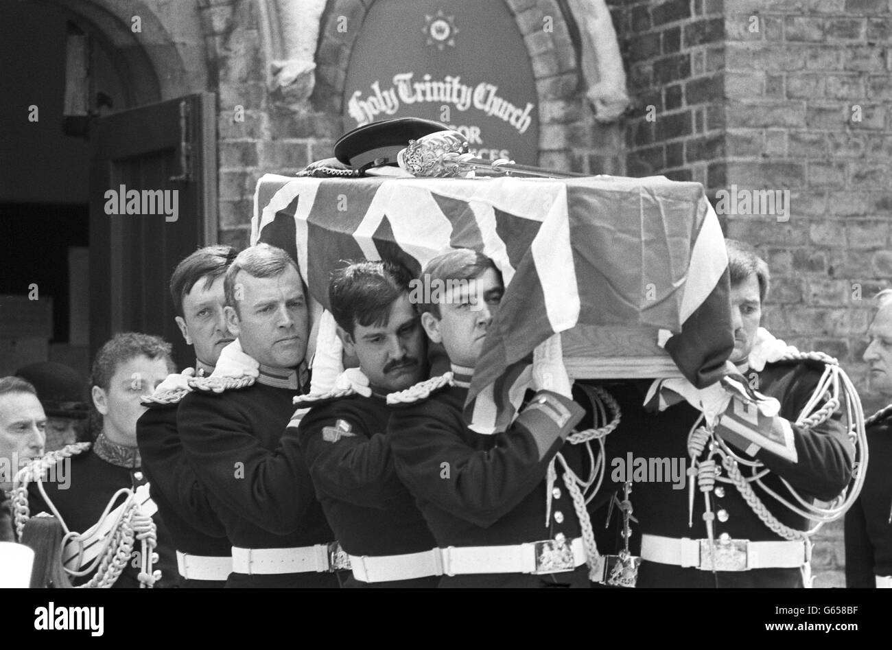 The flag-draped coffin carrying Lt Anthony Daly, the Blues and Royals officer killed in the Hyde Park bombing, leaves Windsor's Holy Trinity Church. Stock Photo