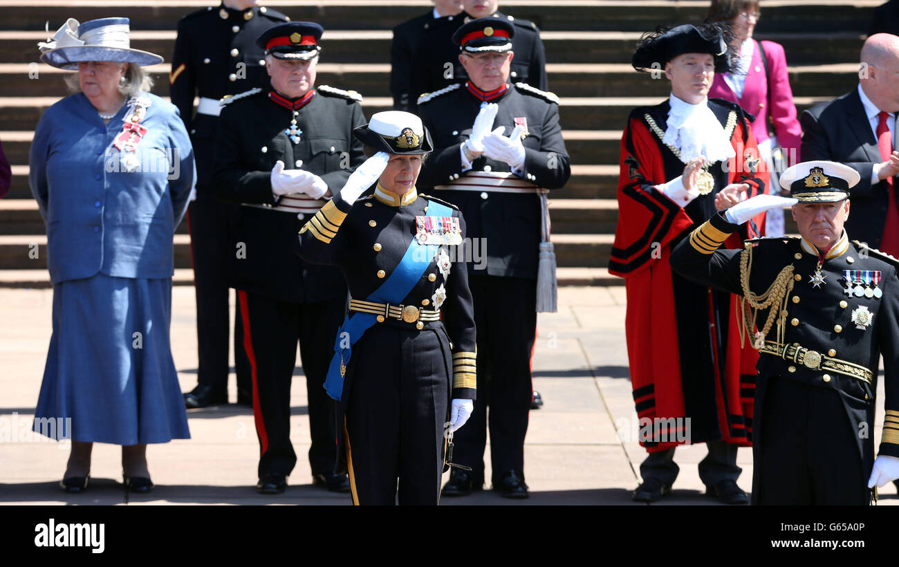 The Princess Royal (centre) salutes the parade, after the 70th anniversary of The Battle of the Atlantic service at Liverpool's Anglican Cathedral. Stock Photo