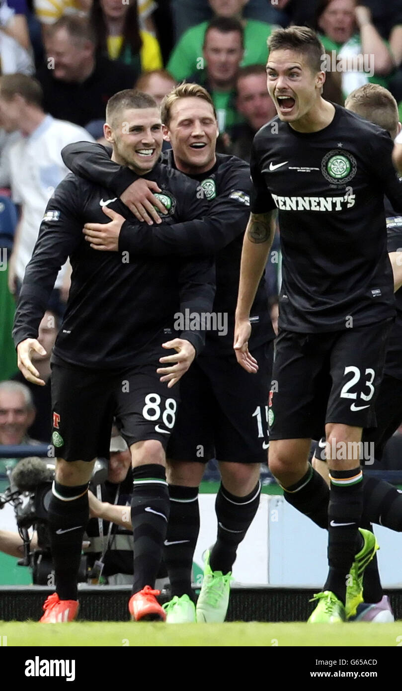 Celtic's Gary Hooper(left) celebrates his second goal with Kris Commons and Mikael Lustig during the William Hill Scottish Cup Final at Hampden Park, Glasgow. Stock Photo