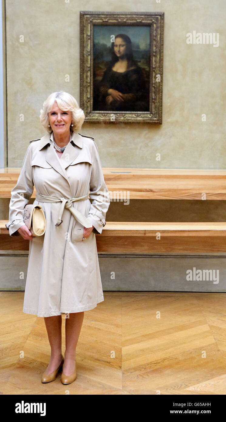 The Duchess of Cornwall stands in front of Leonardo Da Vinci's Mona Lisa during a visit to the Louvre Museum in Paris, France. Stock Photo