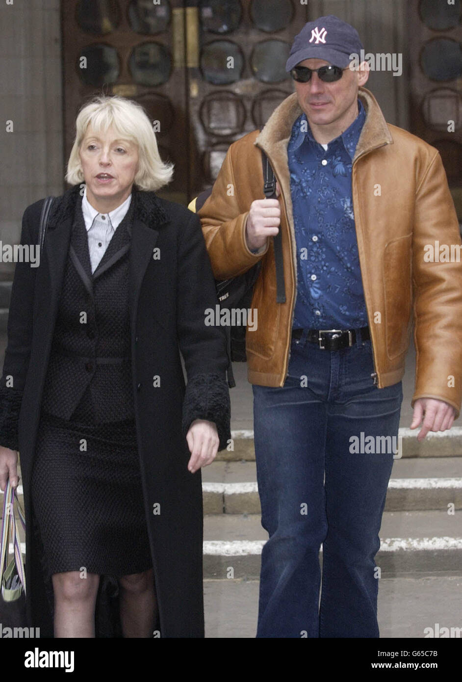 Businessman, Pepe Parra with a legal representative, leaving the High Court, London, after taking his former wife to court because he was awarded less than half their 2.5 million marriage assets today won his battle for equality. * Pepe Parra had argued in the Court of Appeal that a High Court settlement meant that his former wife Yvonne would have net liquid assets of more than 800,000 and a mortgage-free house while he would spend the next 20 years working to pay off debts of around 1 million. Stock Photo