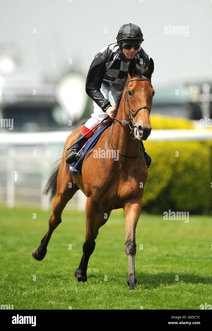 Beatrice Aurore ridden by jockey Frankie Dettori goes to post in