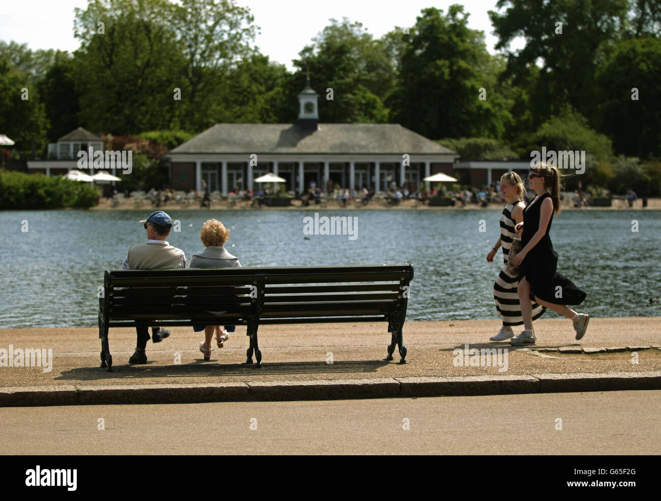 People take time to enjoy the hot weather in Hyde Park, central London