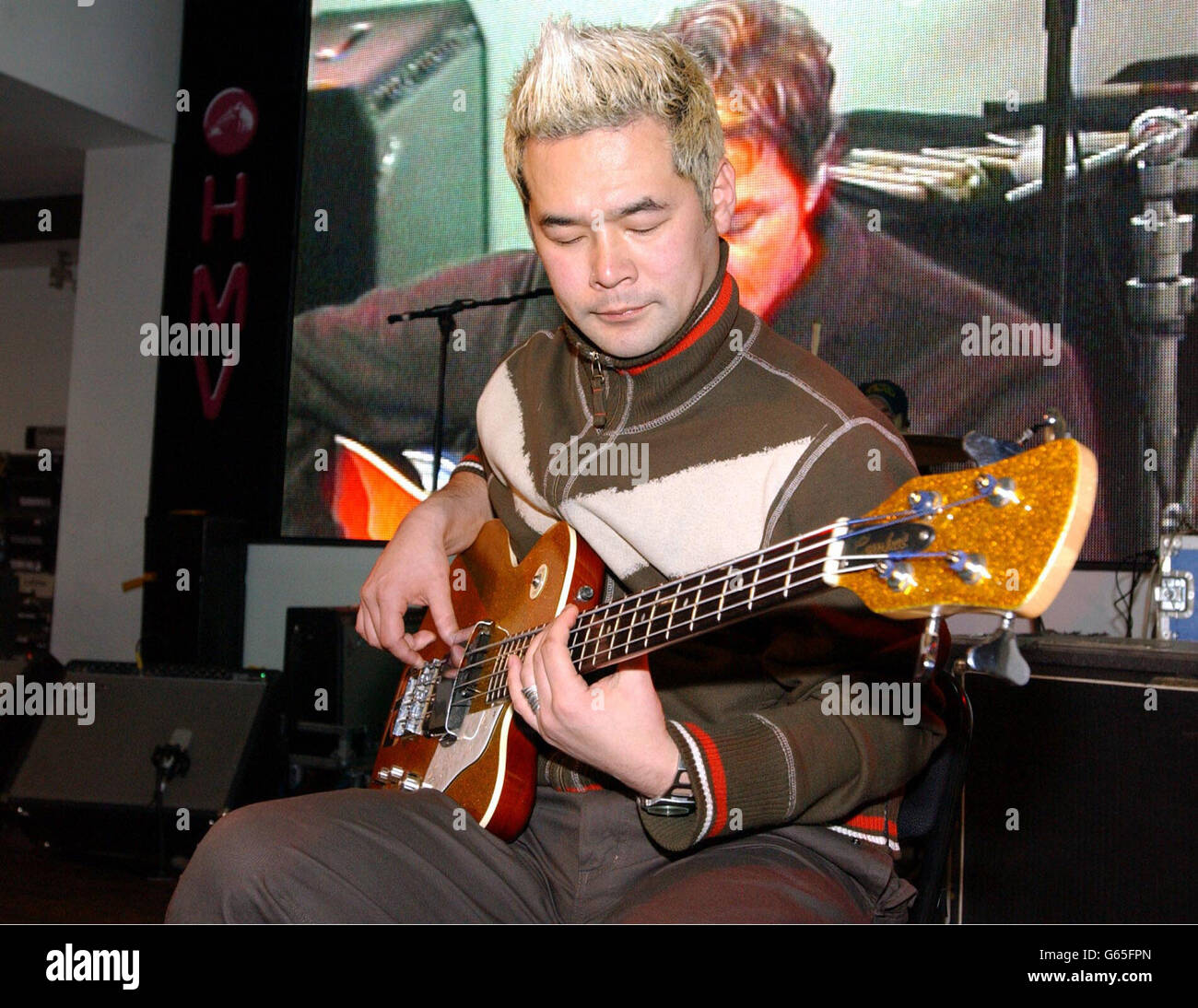Taka Hirose Feeder Taka Hirose Bassist Of The Band Feeder Performing A Live Set At The Hmv Store In London S Oxford Street Stock Photo Alamy