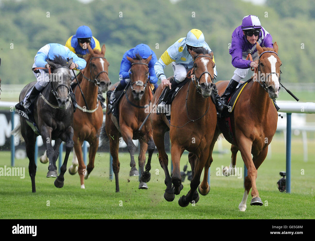 Moment In Time ridden by Jim Crowley (second from the right) beats Nymphea ridden by Andrasch Starke (right) to win the BetVictor Royal Ascot Money Back Pinnacle Stakes during Timeform Jury Stakes / Sandy Lane Stakes day at Haydock Park Racecourse, Newton-Le-Willows. Stock Photo