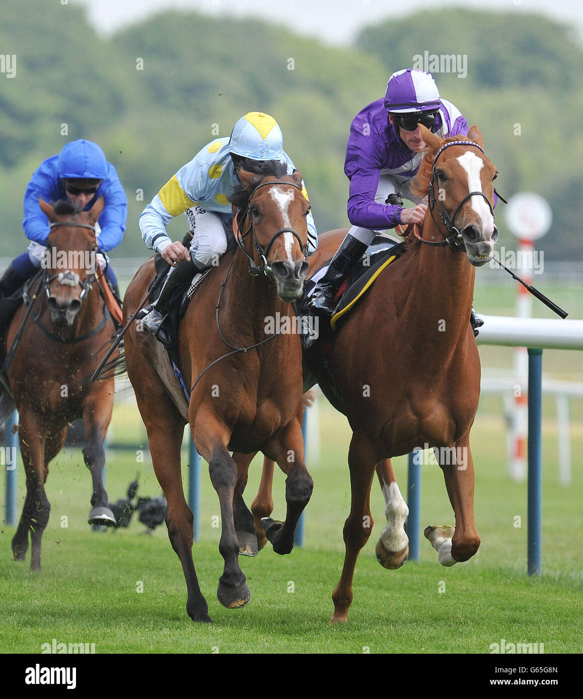 Moment In Time ridden by Jim Crowley (centre) beats Nymphea ridden by Andrasch Starke (right) to win the BetVictor Royal Ascot Money Back Pinnacle Stakes during Timeform Jury Stakes / Sandy Lane Stakes day at Haydock Park Racecourse, Newton-Le-Willows. Stock Photo