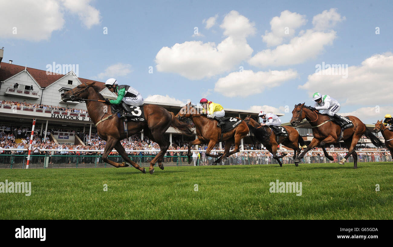 Artistic Jewel ridden by Graham Lee (left) wins the BetVictor.com EBF Cecil Frail Stakes during Timeform Jury Stakes / Sandy Lane Stakes day at Haydock Park Racecourse, Newton-Le-Willows. Stock Photo