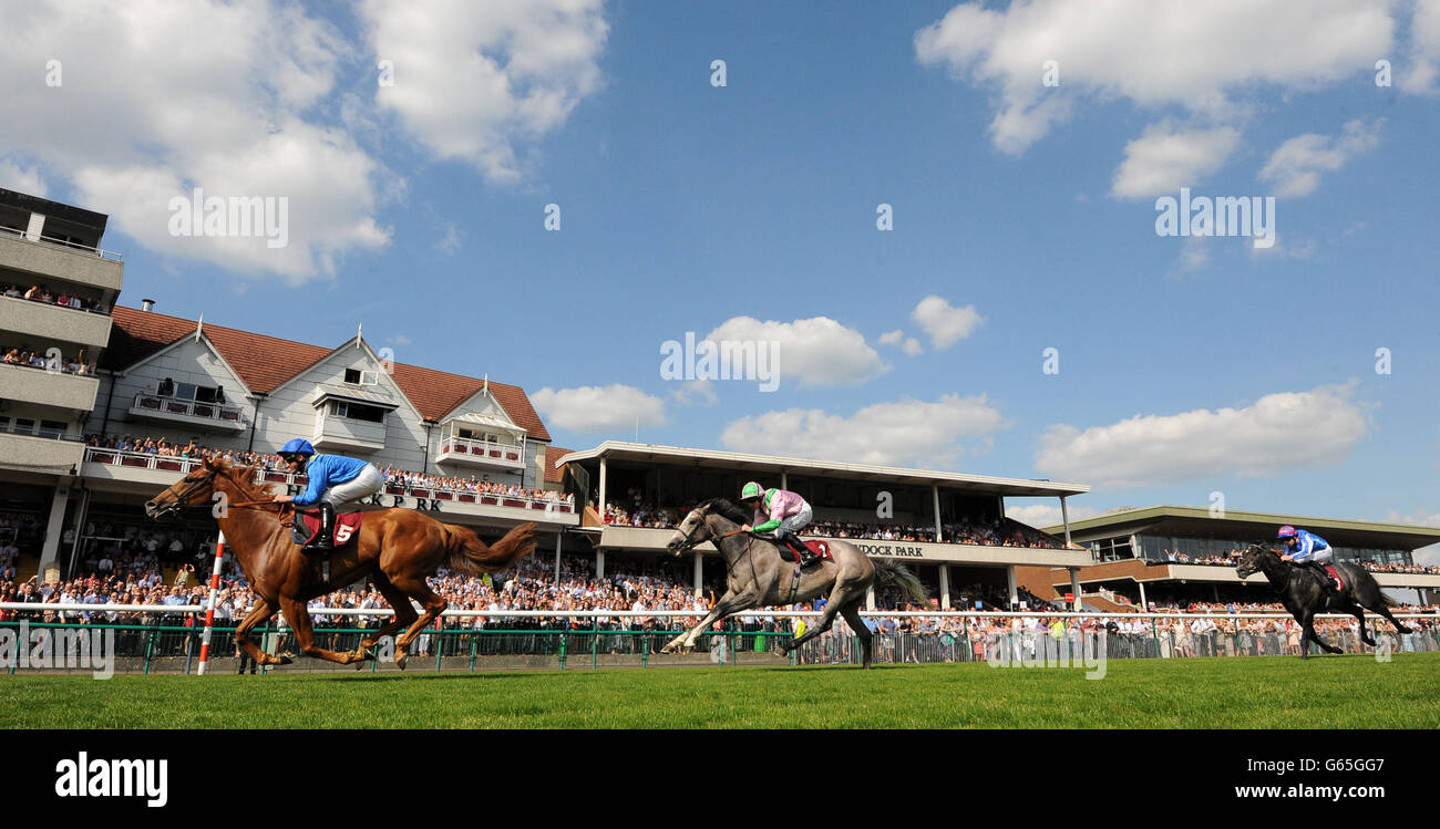 Professor ridden by Pat Dobbs (left) wins the BetVictor No Lose Hughes Money Back Sandy Stakes during Timeform Jury Stakes / Sandy Lane Stakes day at Haydock Park Racecourse, Newton-Le-Willows. Stock Photo
