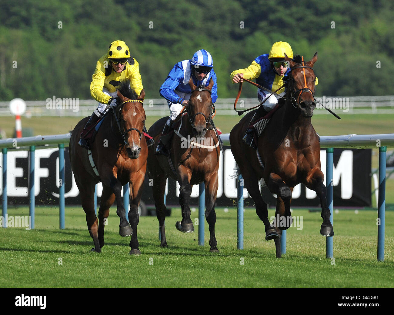 Double Discount ridden by Richard Kingscote (right) beats Elhaame ridden by Kieren Fallon (left) to win the Royal Ascot Money Back at BetVictor.com Classified Stakes during Timeform Jury Stakes / Sandy Lane Stakes day at Haydock Park Racecourse, Newton-Le-Willows. Stock Photo