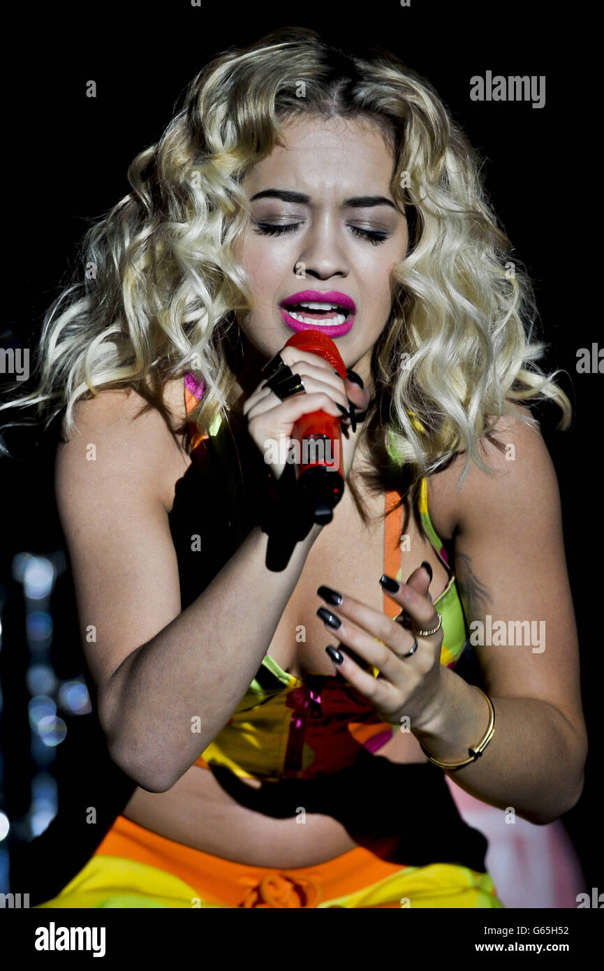 Singer Rita Ora performs on stage at Newbury Racecourse. Stock Photo