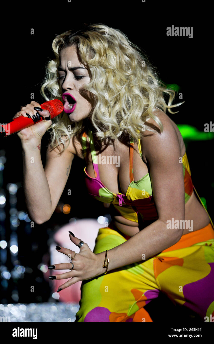 Singer Rita Ora performs on stage at Newbury Racecourse. Stock Photo