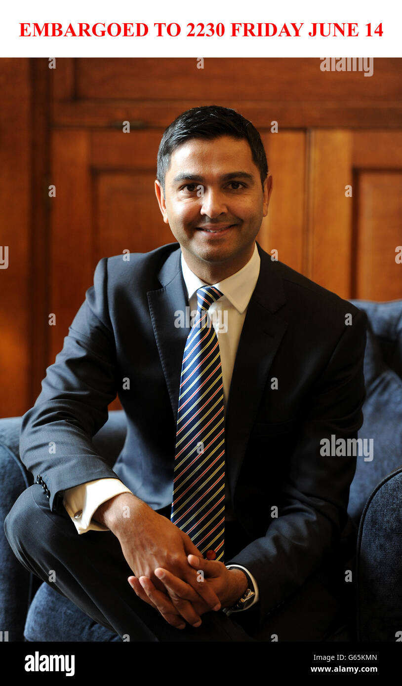 Cricketer Wasim Khan who received an MBE (Member of the British Empire