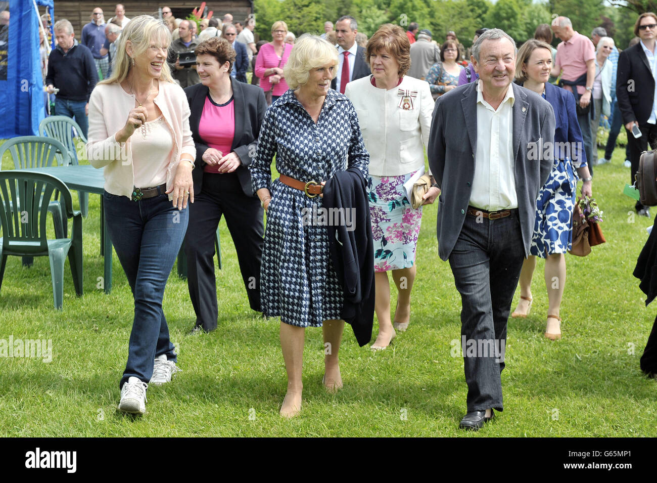 The Duchess of Cornwall with Pink Floyd drummer Nick Mason and his wife Annette during a visit to Middlewick House in Pickwick, Wiltshire, the home of Pink Floyd drummer Nick Mason, which is holding a charitable garden open day. Stock Photo