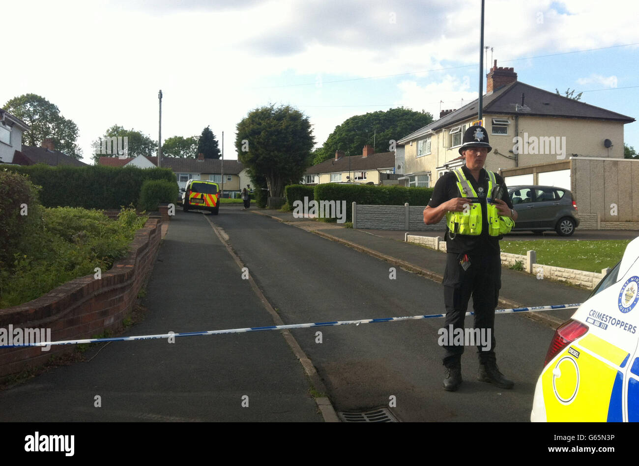 Police at Chells Grove in billesley, Birmingham where a mother and her baby were found murdered. Stock Photo