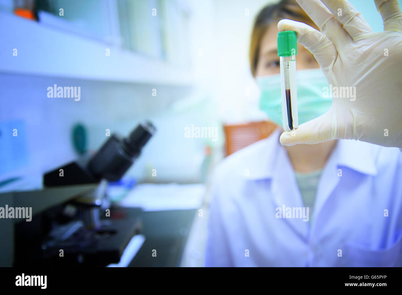 blood test tube in asia doctor hand Stock Photo
