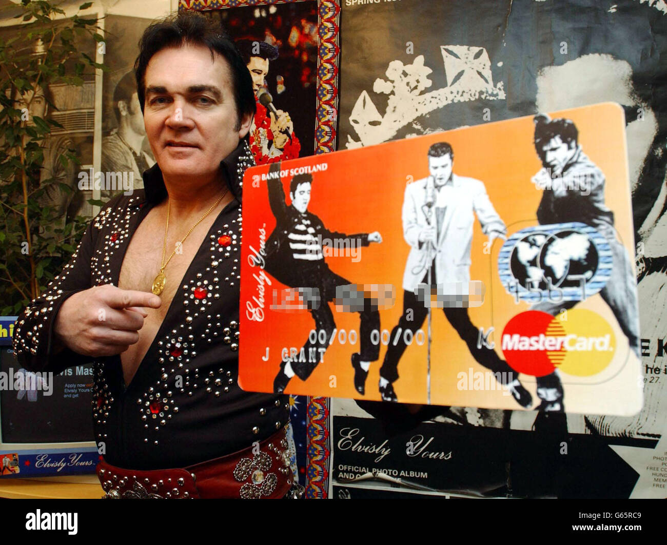 MAY 13th: On this day in 1951, Diners Club issued the first credit card to 200 customers who could use it at 27 restaurants in New York. Elvis impersonator Liberty Mounten at the launch of on-line applications for the Bank of Scotland's Elvis Presley Credit Card in Elvisly Yours in Baker Street, central London which would have been Elvis' 68th Birthday. Stock Photo