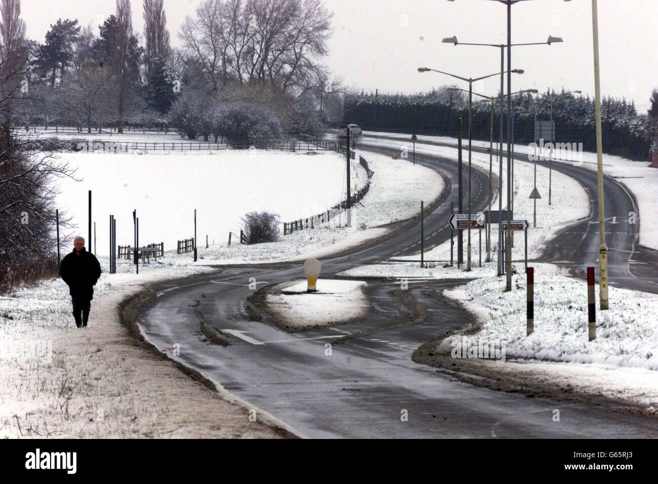 An empty A130 road in East Hanningfield, Essex where there were heavy falls of snow. * During a night of heavy frost, temperatures sank as low as minus 8C in Farnborough, Hampshire, and Hawarden in north east Wales and plunged to minus 16C in the Highland town of Aviemore. Stock Photo